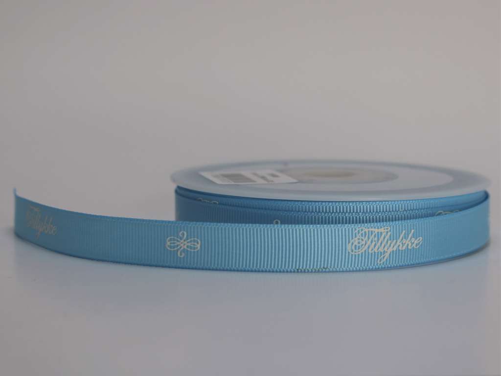 Tillykke bånd lyseblå 13mm x 20m