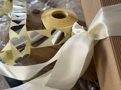 Silk ribbon 25mm cream colored smooth 91 meters