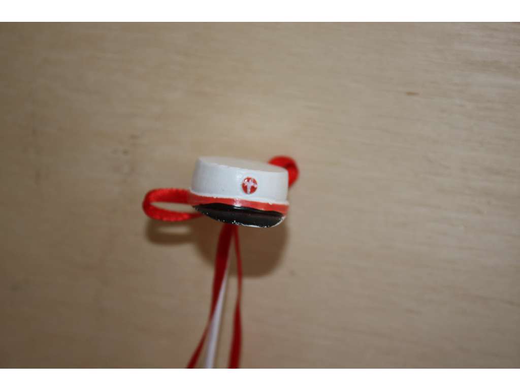 Studenterhuer på pind - røde